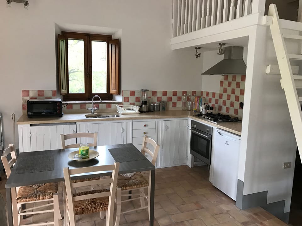 Cozy 2nd kitchen in annex/guest house. Ladder to loft for extra bedroom.