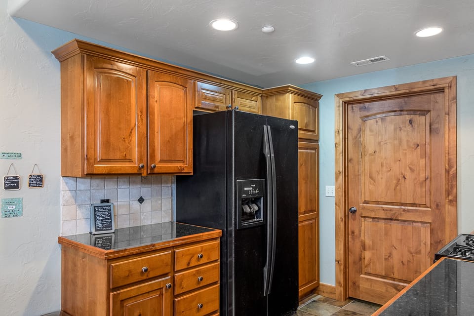 Beautiful Alder wood doors and cabinets will warm your spirits