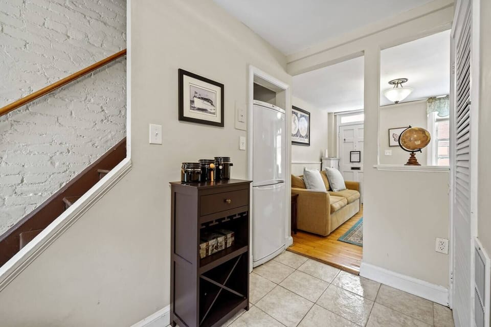 Open area to kitchen.  Stairs lead to bed and bath