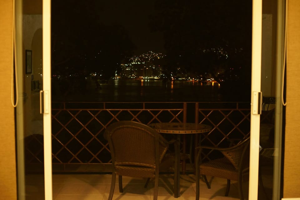 Balcony at night and view from living room 