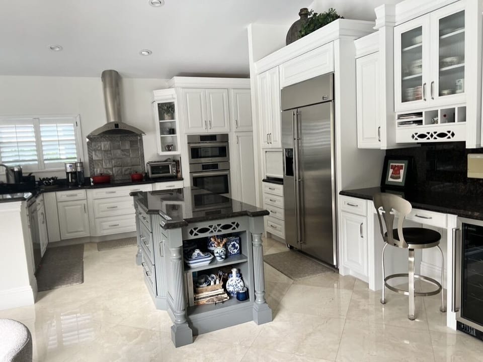 A kitchen that’s filled with pots, pans, utensils, spices, etc. etc. etc.