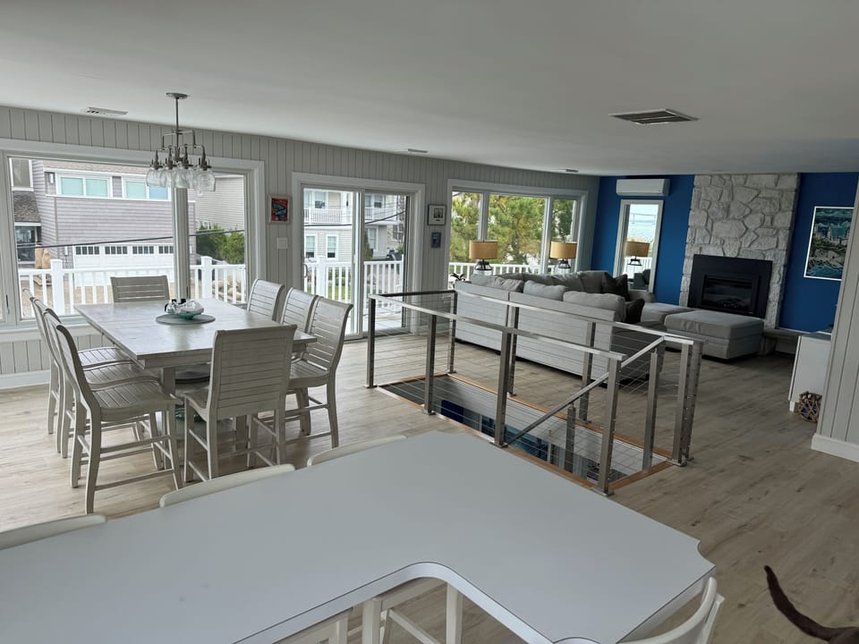 Just Updated!  New floor and railings in open plan upper level.
