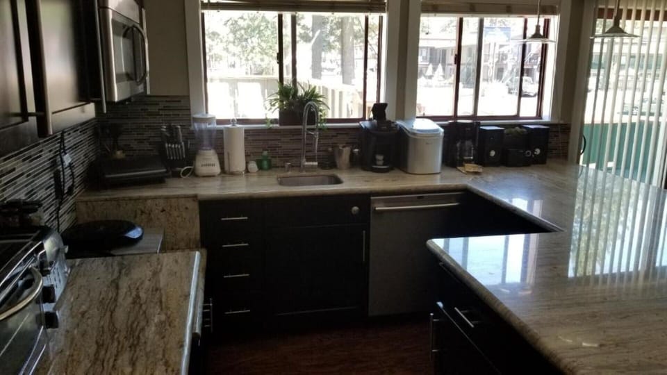 Large kitchen. Dishwasher, 2 induction cooktops, combo microwave/oven, coffee