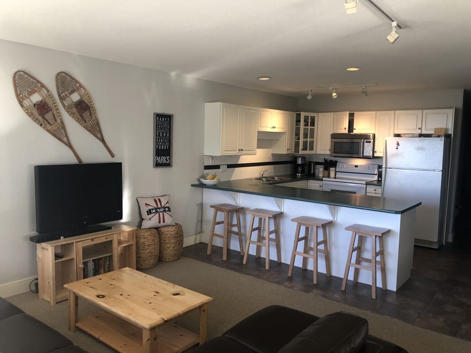 Large kitchen overlooking the living room and the beautiful view (old photo!)