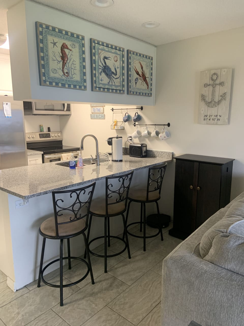 new granite counter tops and stainless appliances await you in the kitchen