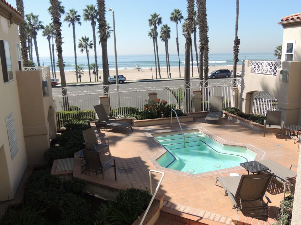 Jacuzzi with ocean and sunset views