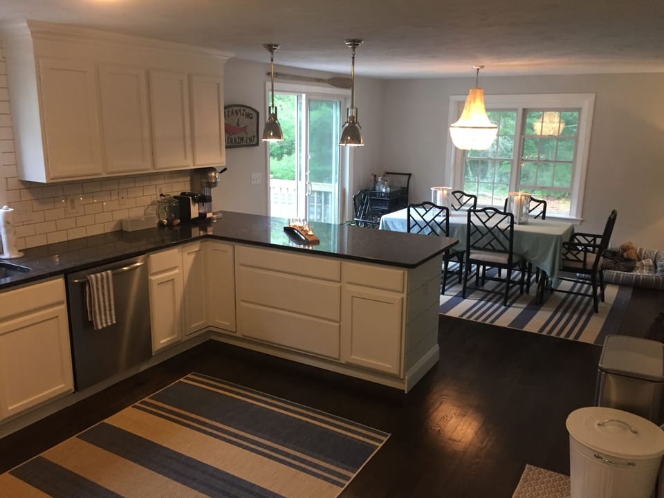 open kitchen and dining area with slider to outdoor space