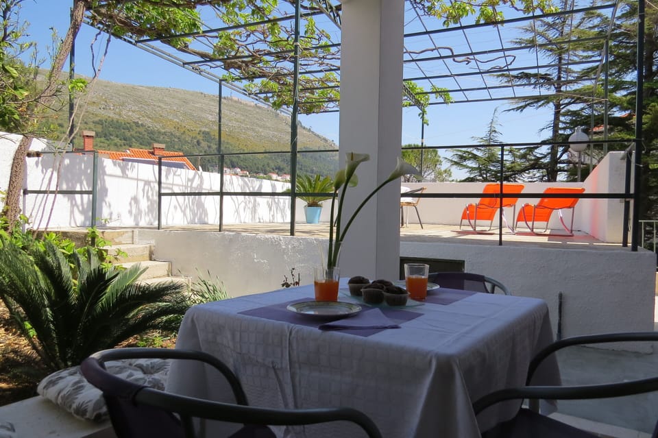 terrace, mountain and city view