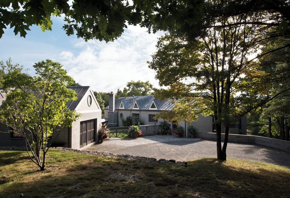 The house sits on 20 acres, down a long private drive.