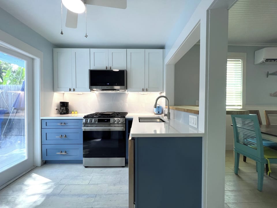 Brand new kitchen with quartz countertops and new stainless steel appliances