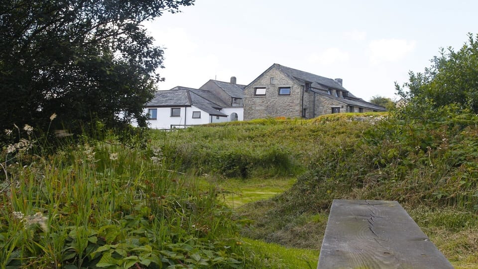 Looking towards Barn , the laundry room and Stable Cottage from the lakes/ground