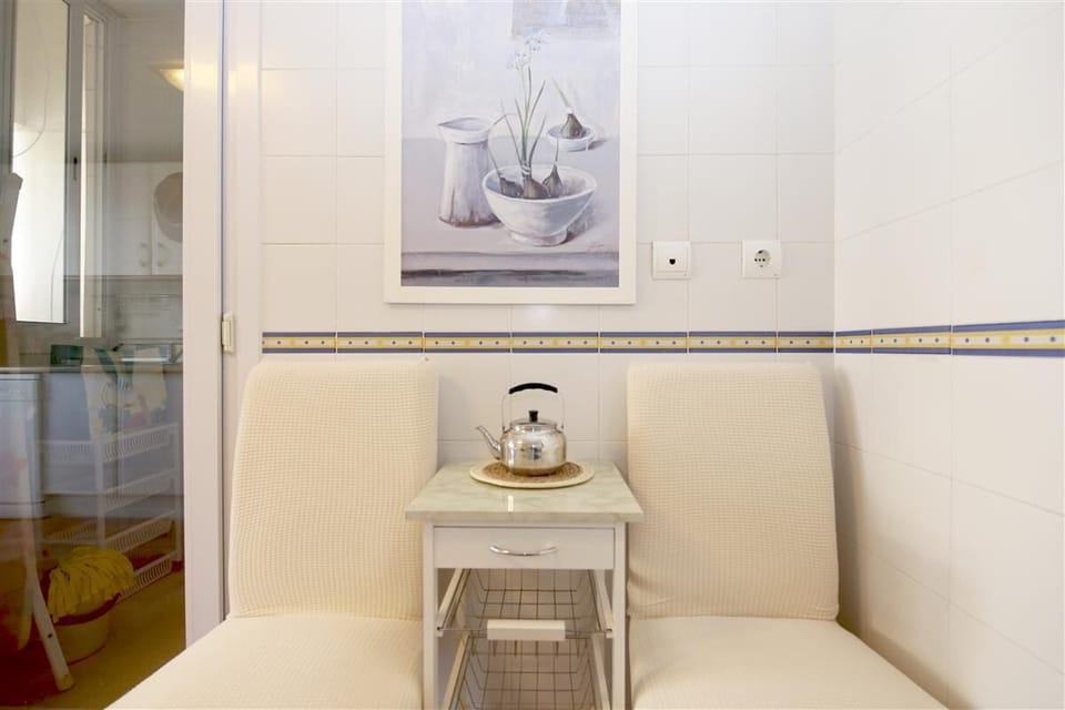 Cozy tea area for two guests in the kitchen