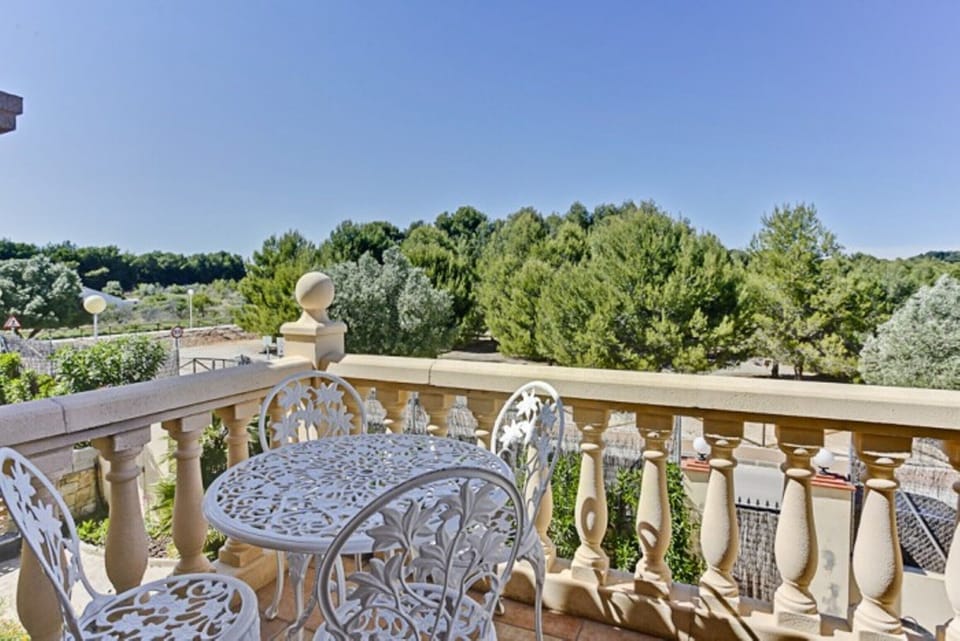 Front of villa woodland view