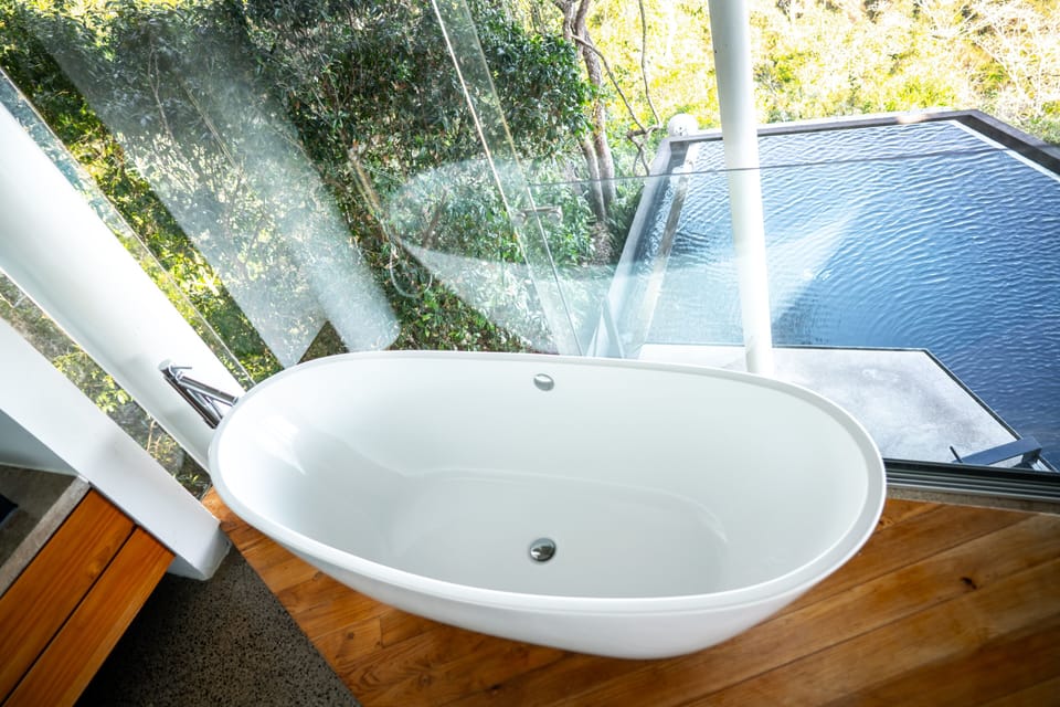Bathtub in the primary suite with ocean views