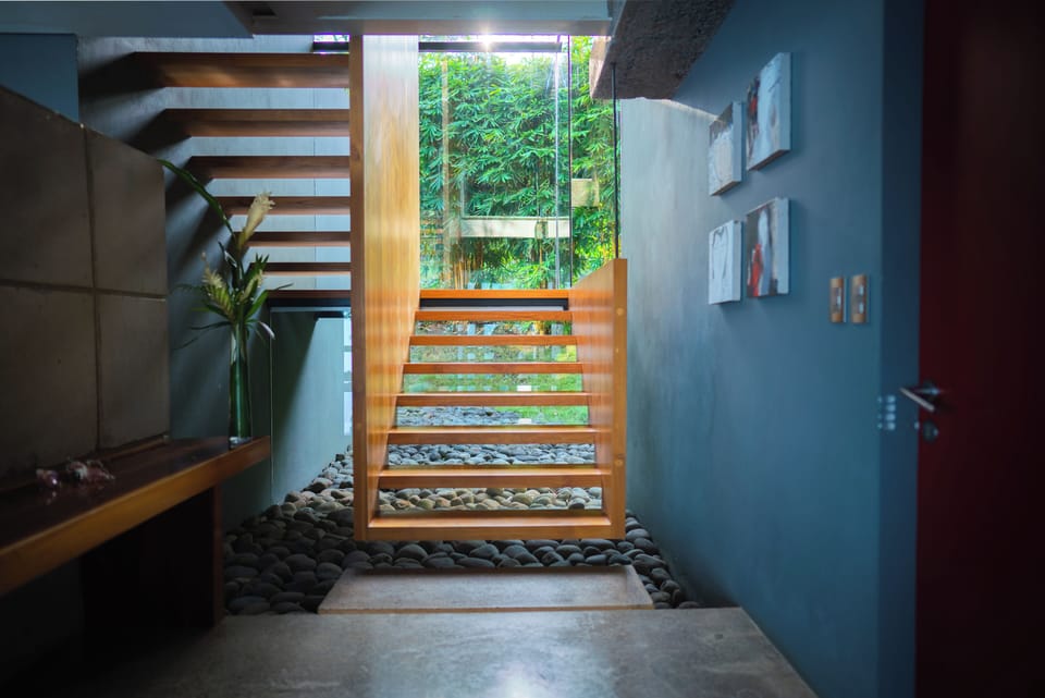 Main floor stairs leading up to the three bedrooms.