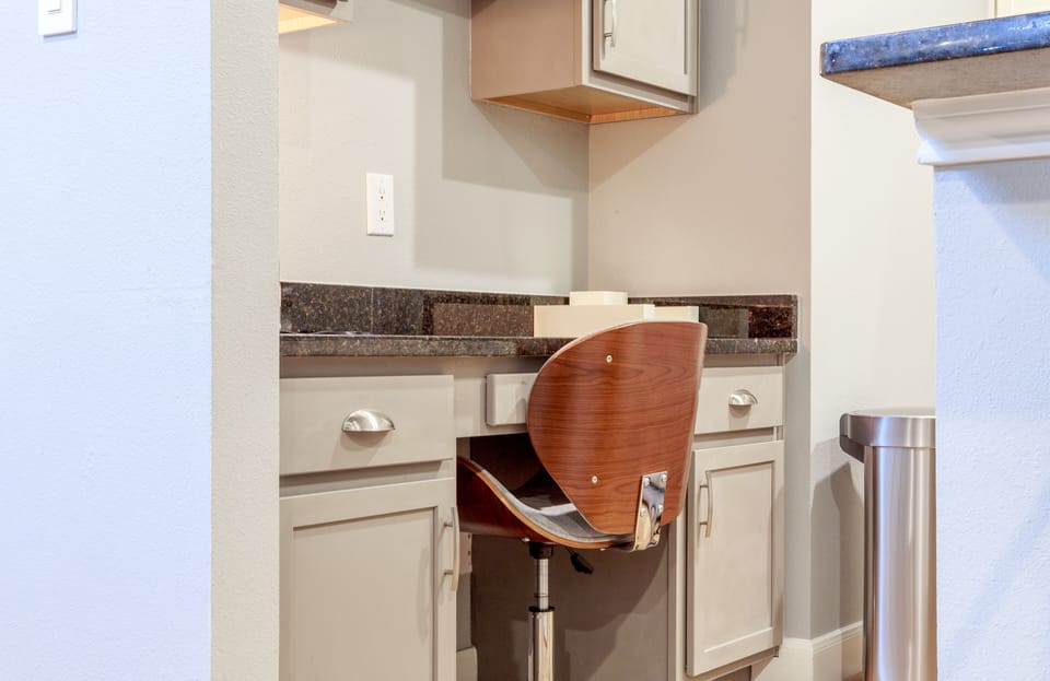 Office nook for business work; plenty of cabinet space.
