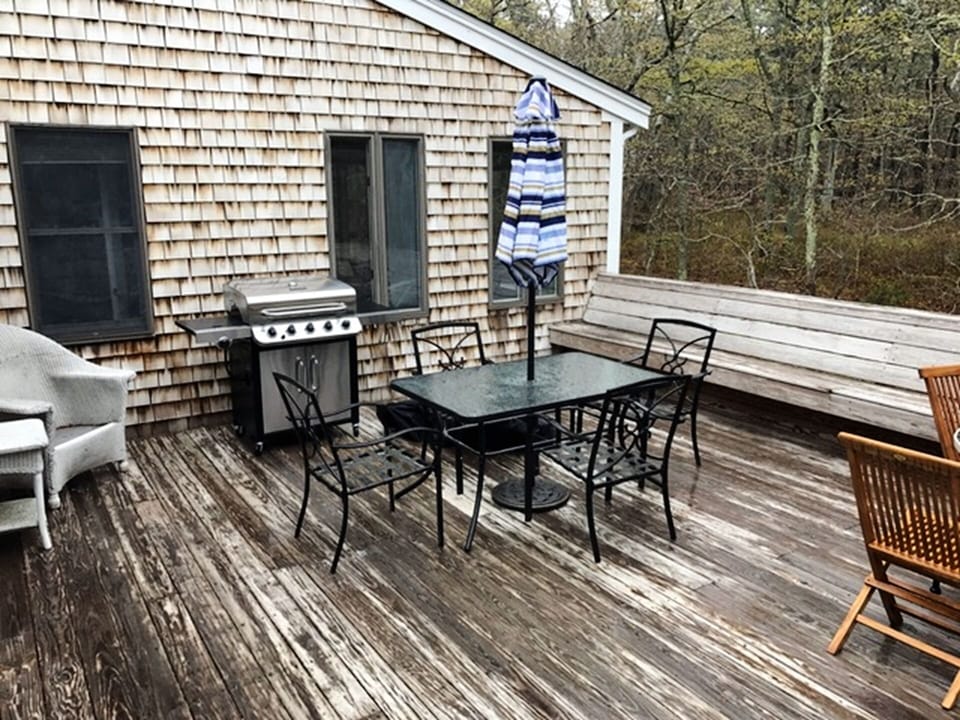 Deck with plenty of seating and Gas Grill