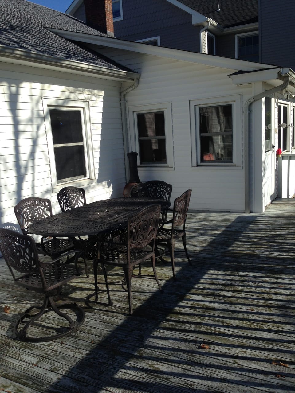 Spacious deck with tasteful and comfortable furniture.