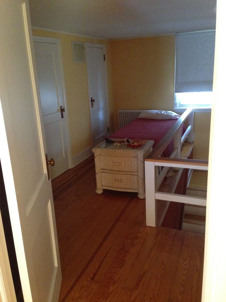Fourth bedroom with pull-out bed at the top of the stairs.