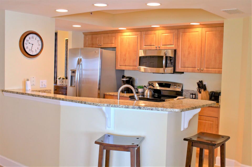 Cook in this fully stocked kitchen, or sit at the bar and watch!