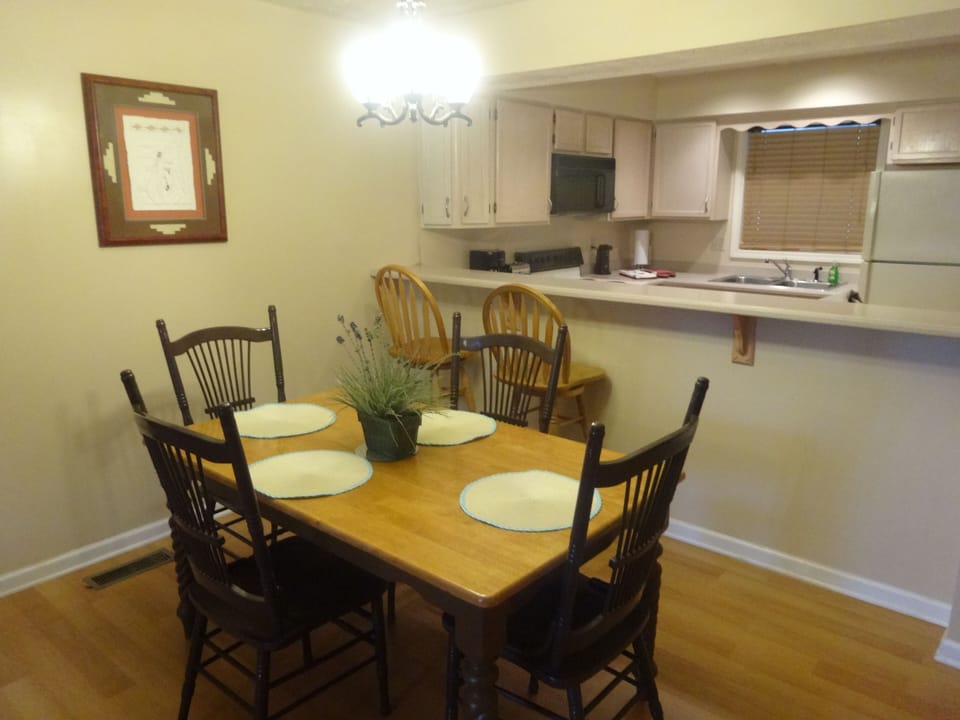 Dining area  with view into kitchen