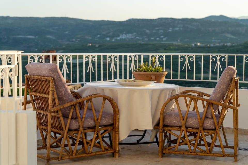 Breakfast on the front veranda with beautiful village views.