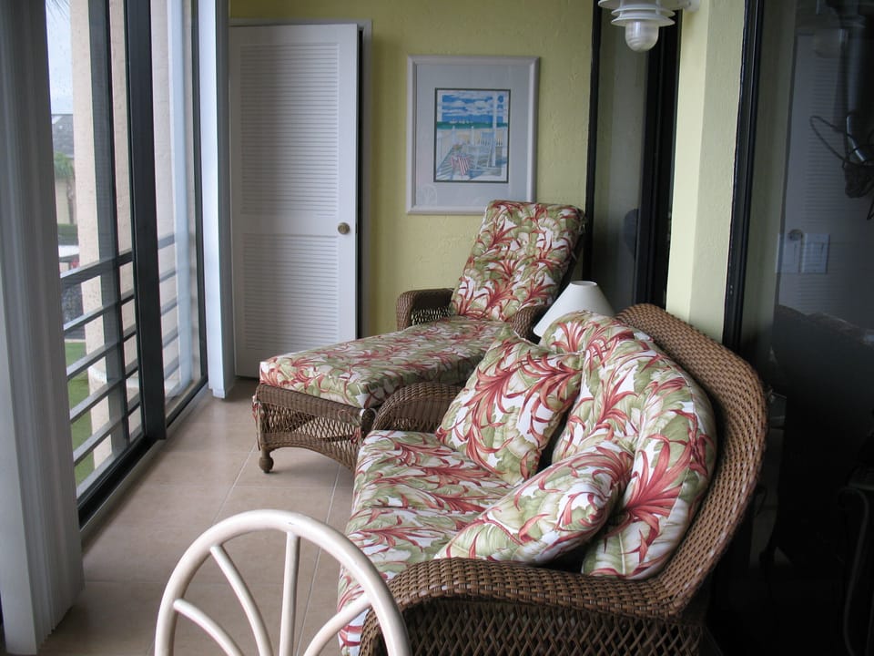 Slide Open The Glass Doors To Let The Breeze In While You Enjoy The Water View