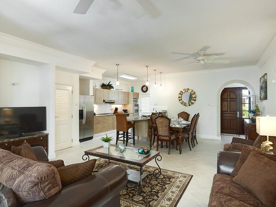 The front door opens to this bright and airy living area