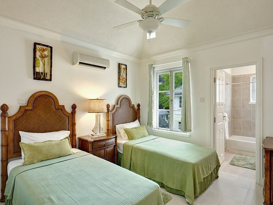 The third bedroom with two singles, that can also be configured as a king bed if need be
