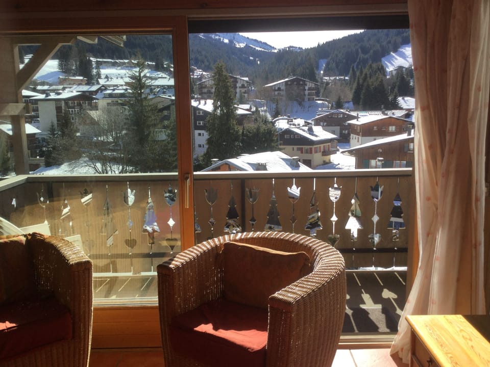 view of the balcony and village from the lounge