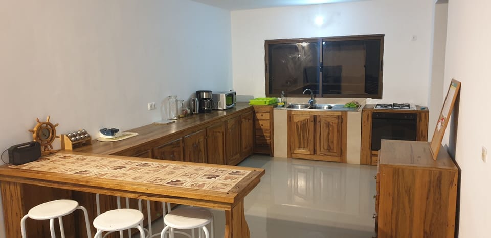 kitchen open space with table & stools