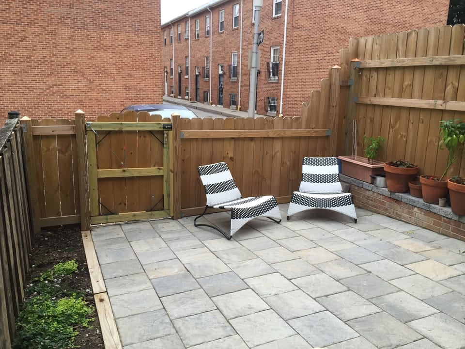 patio with parking directly behind gate