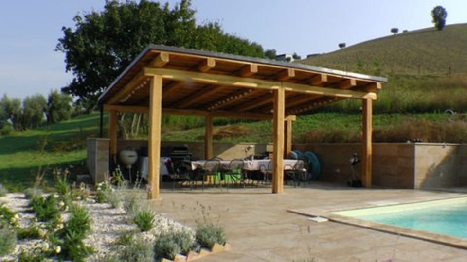 Pergola with barbecue and kitchen 