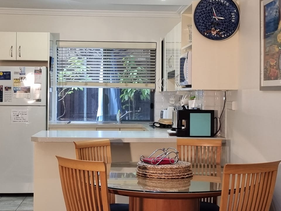 Looking at Dining Area and through to Kitchen.
