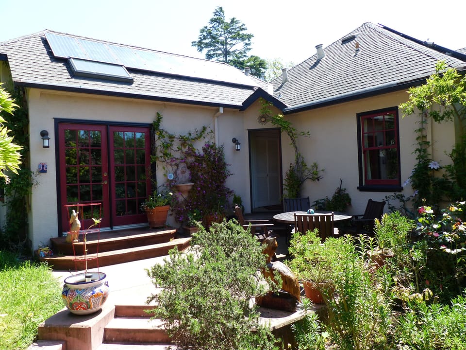 Back of house.  French doors lead to master BR.
