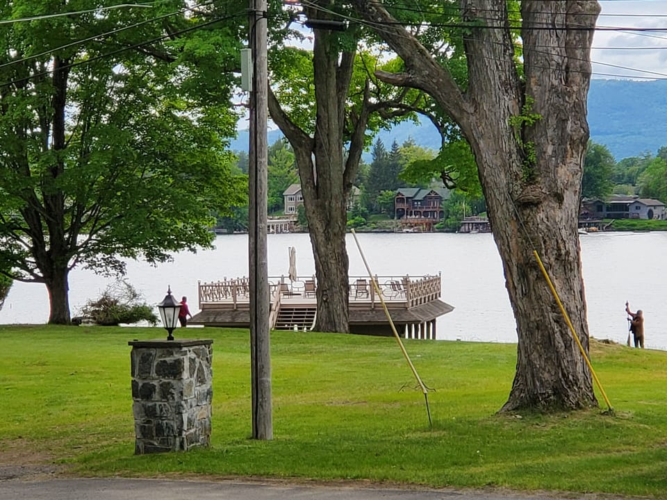 A 100 yrd. walk or golf cart ride to the sundeck, docks and sandy swimming.