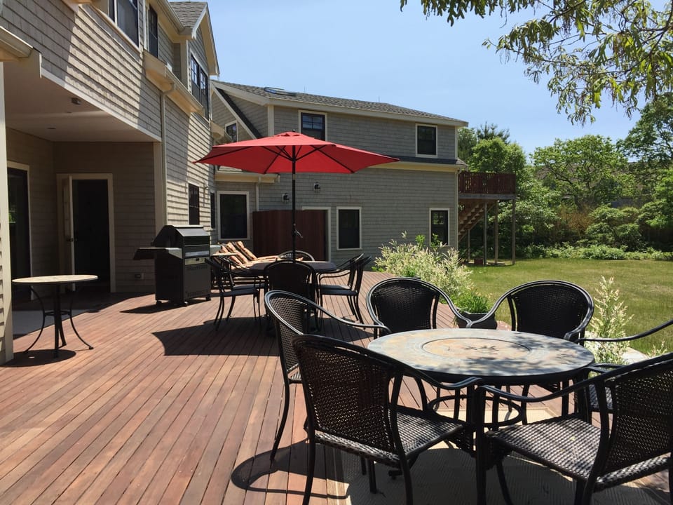 75 feet mahogany deck showing outside shower and side entrance to apartment over