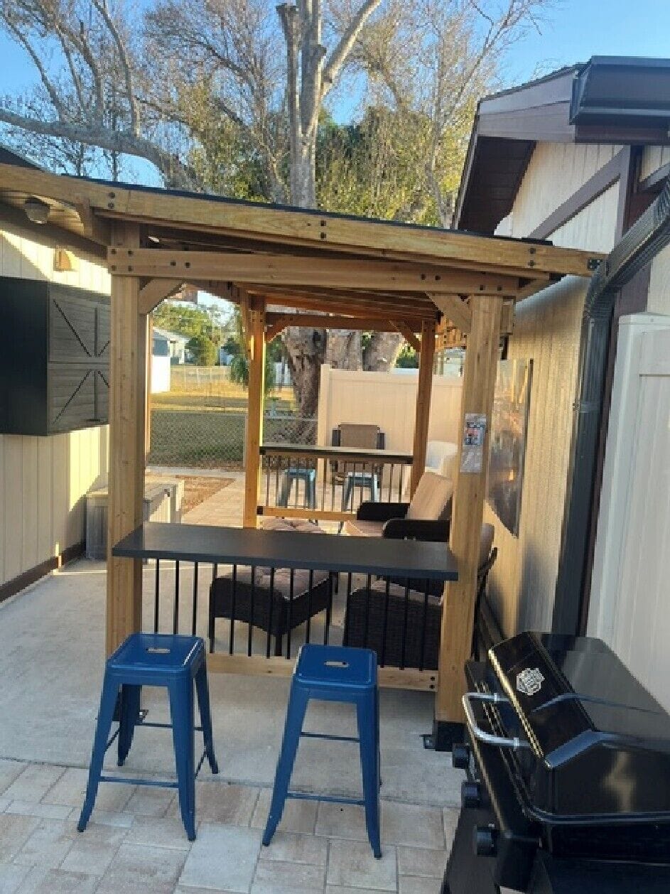 OUTDOOR GAZEBO WITH FURNITURE, TV AND GRILL