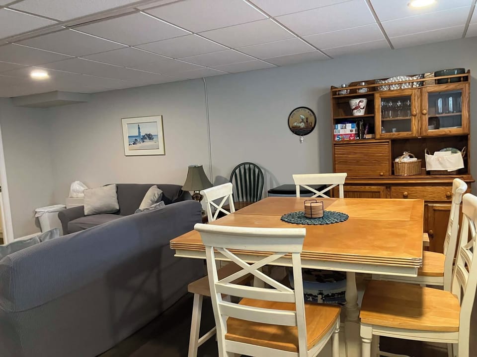 Lower level - expandable puzzle/game/dining table; buffet/hutch; mini fridge