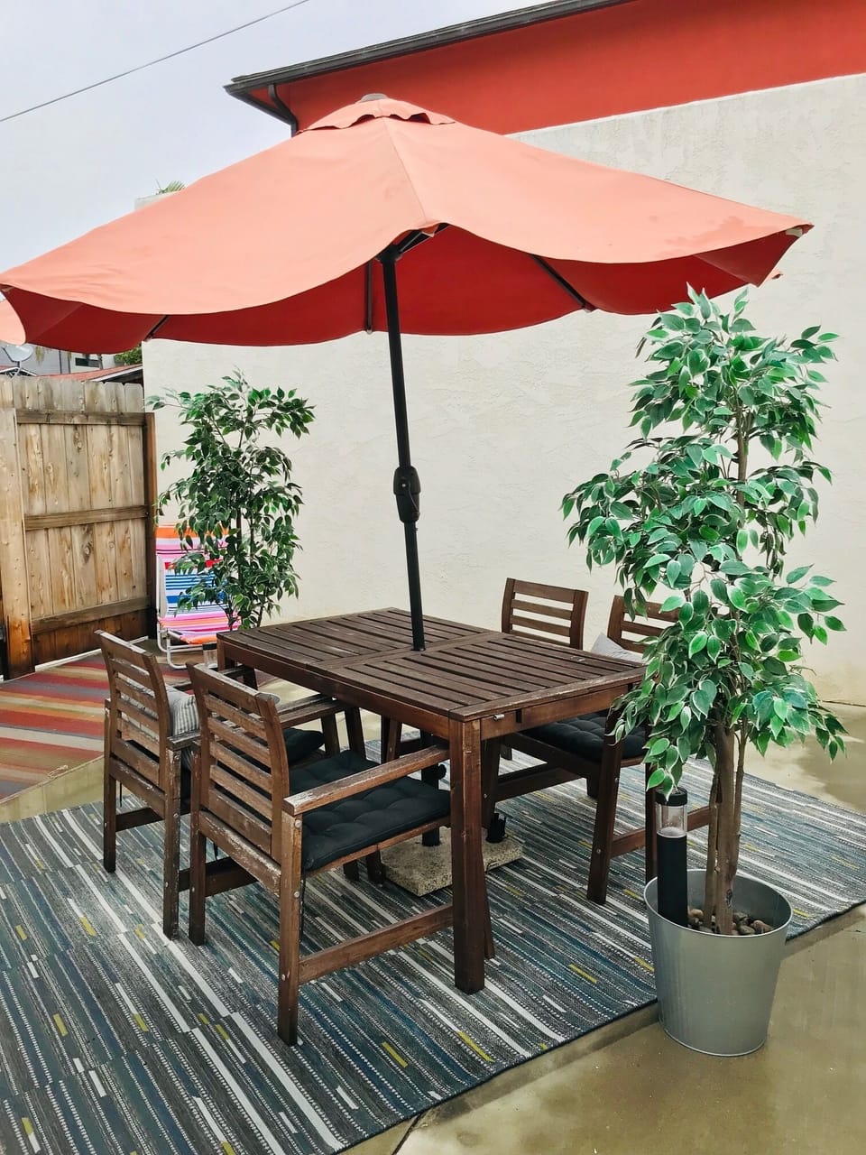 Back fully fenced patio with propane BBQ
