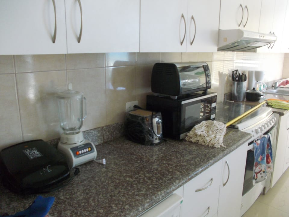 Kitchen Appliances on Wide Granite Surface