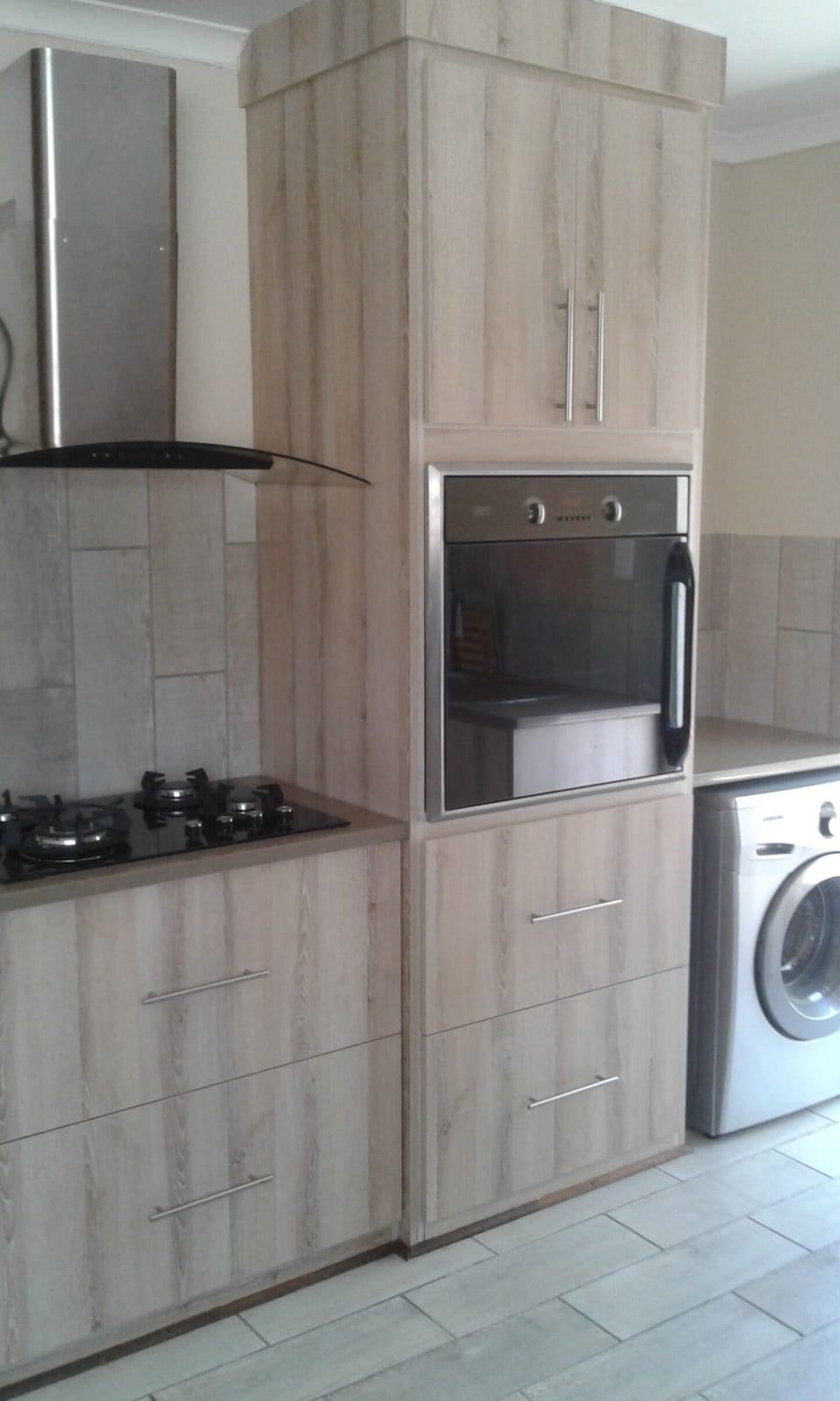 Kitchen with washing machine etc