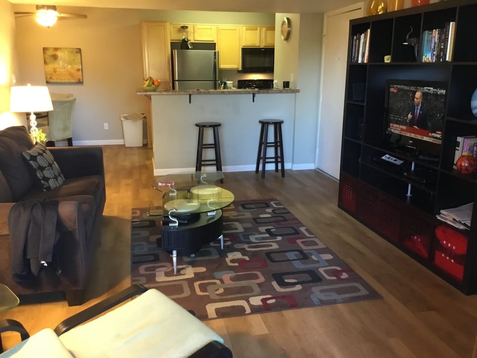 Living room with new laminated flooring.