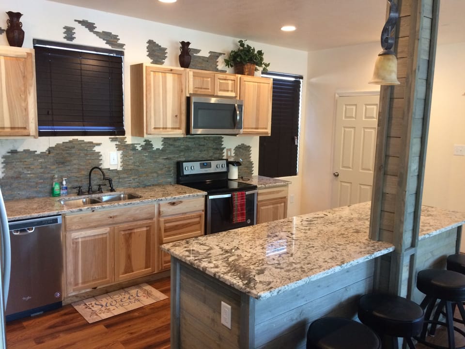 Kitchen island - perfect for dining or laying out food for large gatherings.