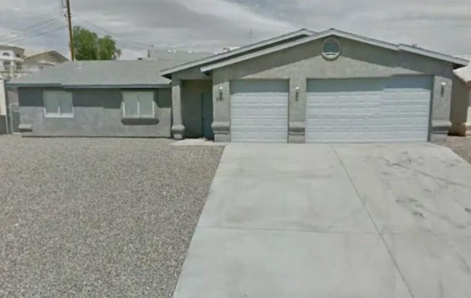 Front of house . 
If you have a boat or ski’s you can pull across the rocks . 