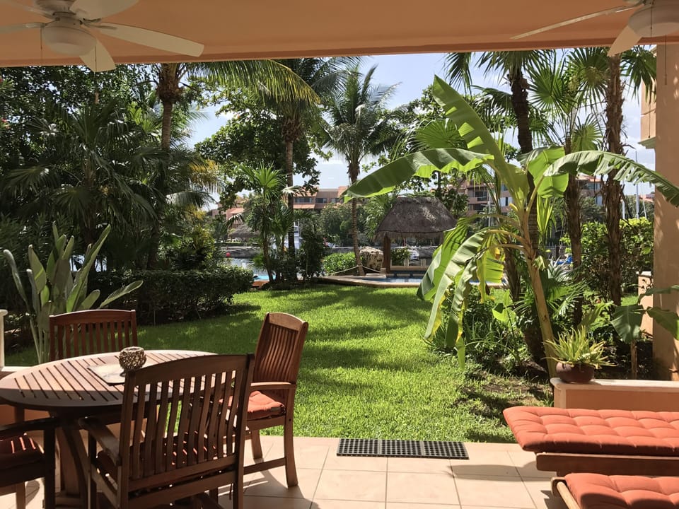 View from the terrace to the palapa and 
 marina.