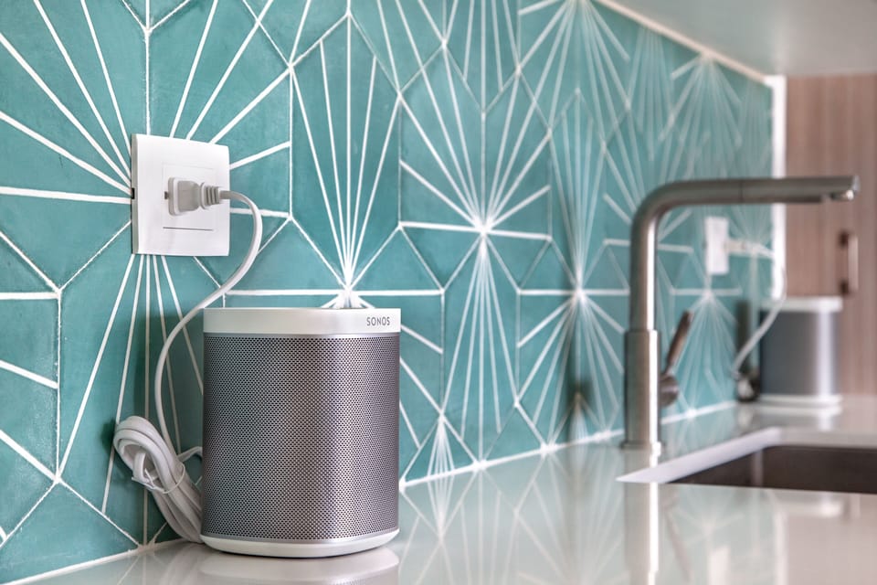 Sonos speakers in kitchen with Deezer account. Use your phone to play some music