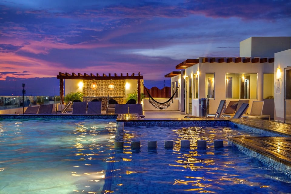 Condo rooftop with lounge area.