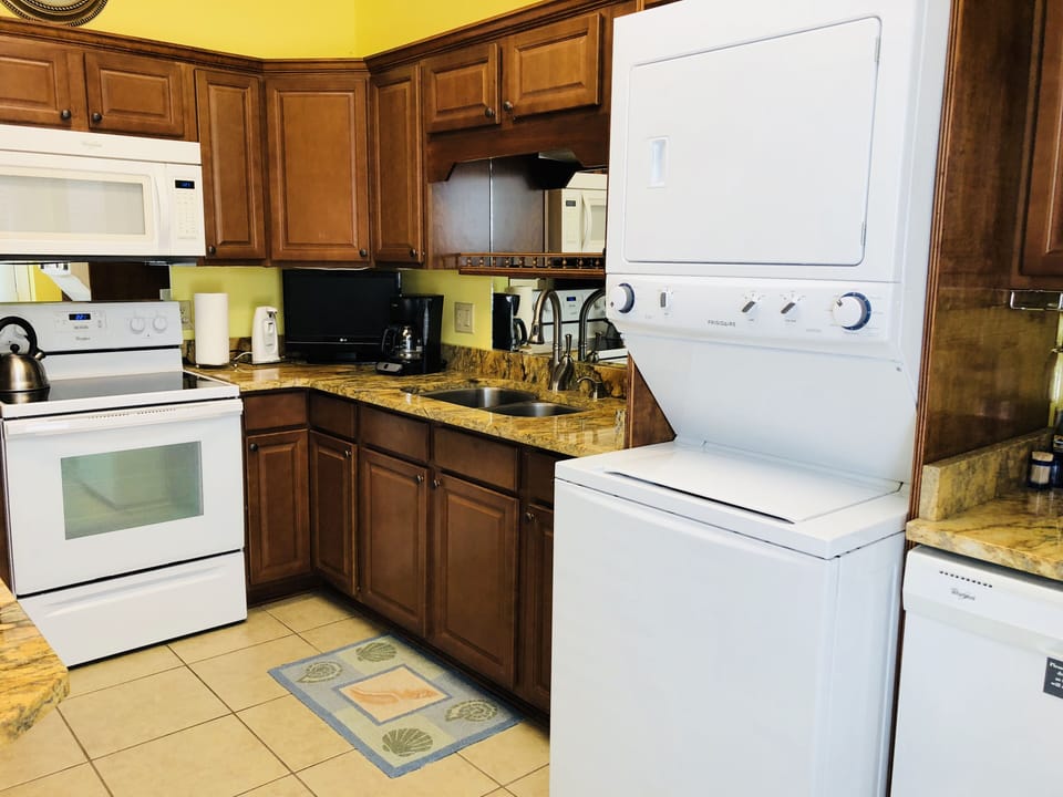 Close-up of washer/dryer, stove, microwave