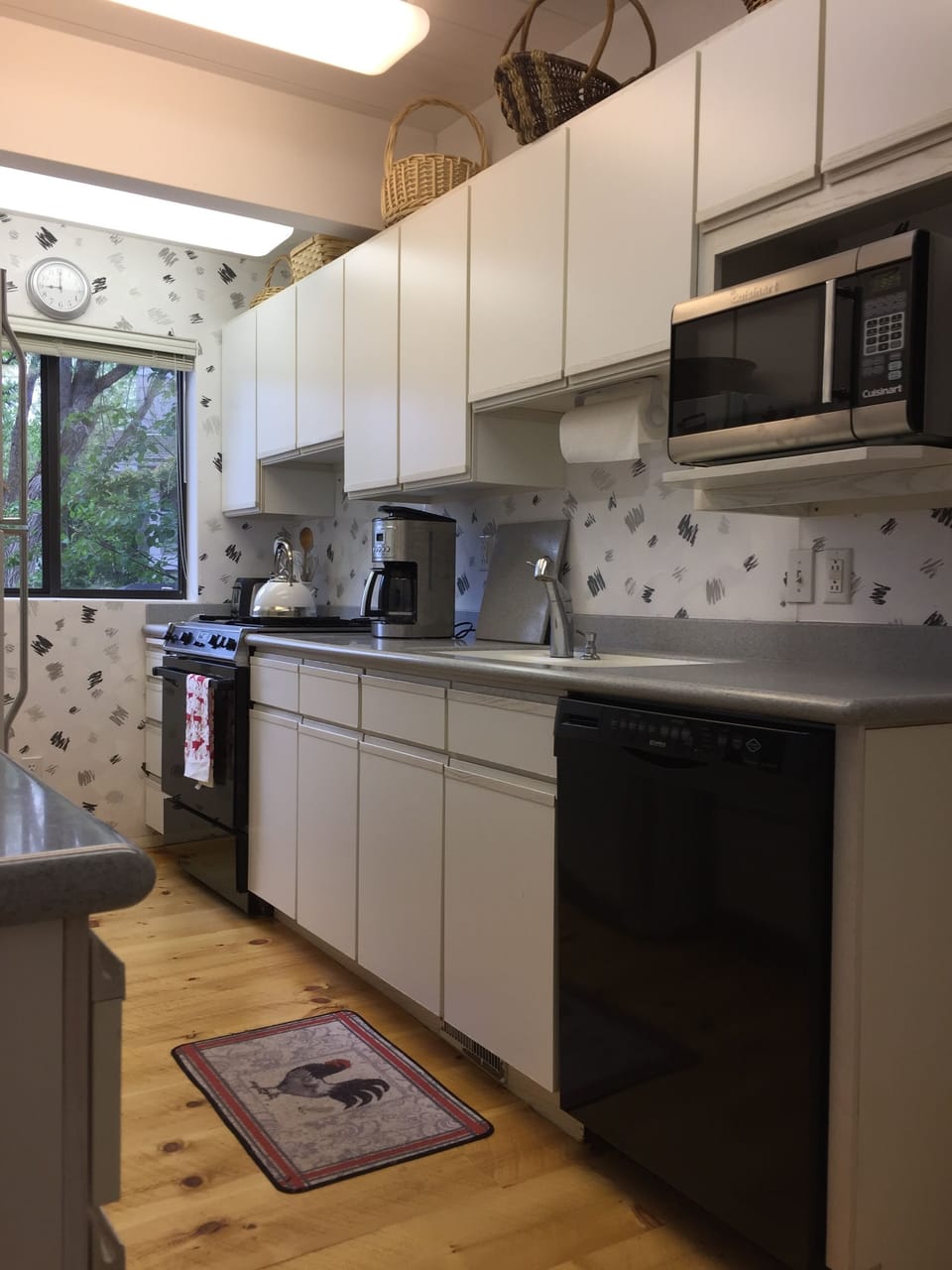 Galley kitchen with every gadget you can imagine!